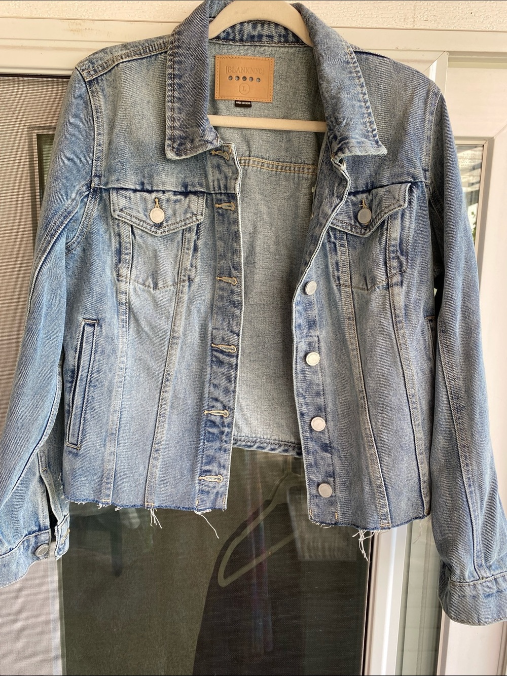 Blank NYC Light Wash Blue Denim Jacket with Raw Hem